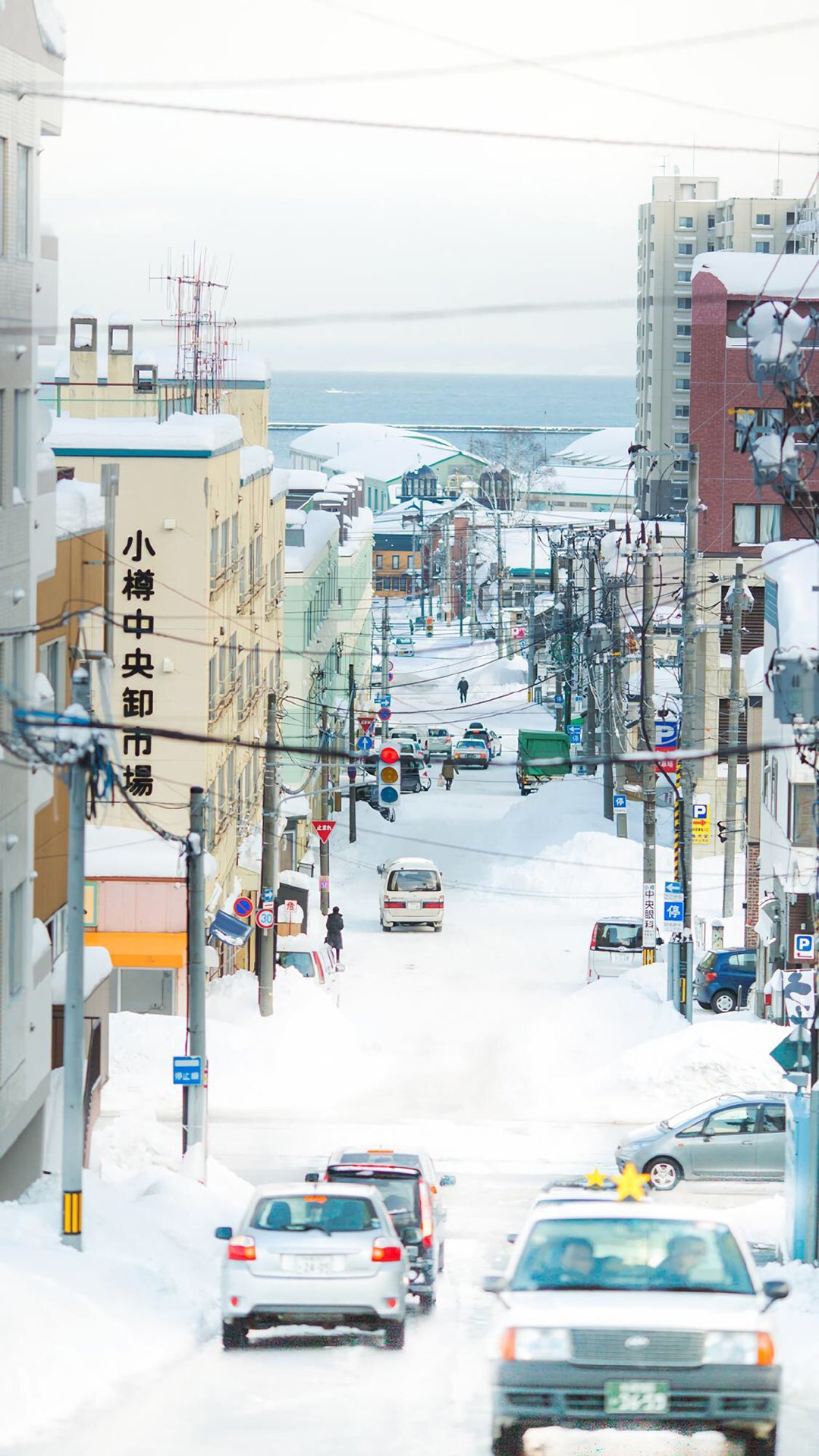 城市街道雪景图片高清手机壁纸